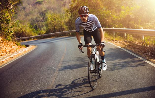 Young man riding bike