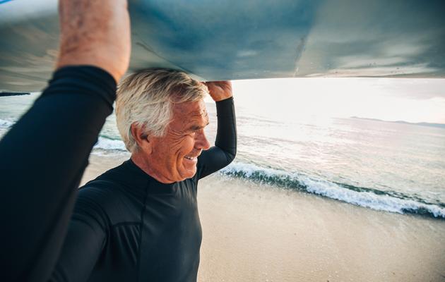 Man walking with surfboard