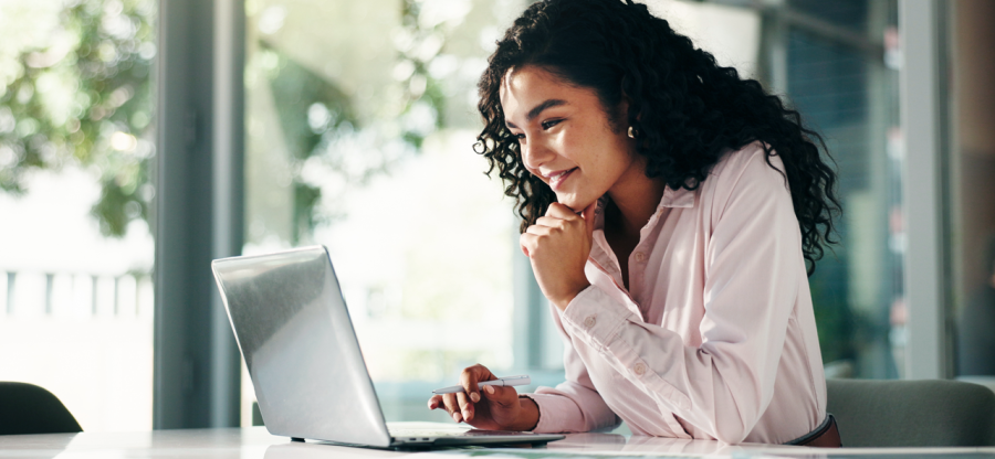 A person looking at her laptop.