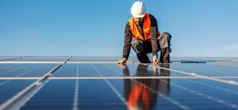 Person installing solar panels