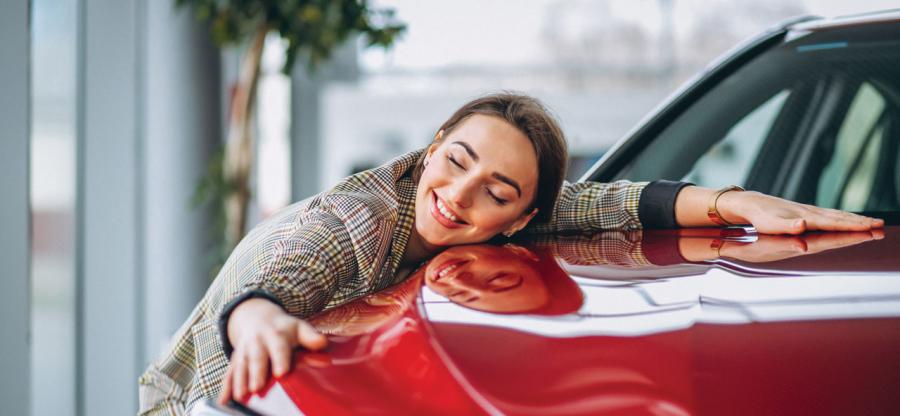 A person and their new car.