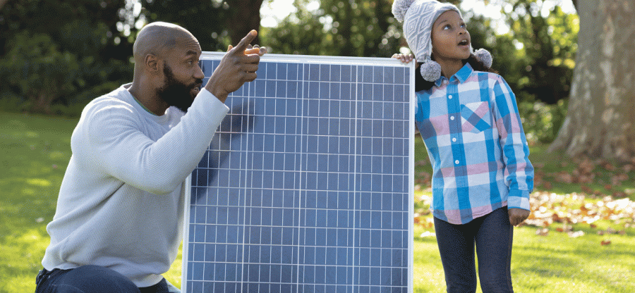 Family with a solar panel