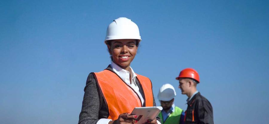 A group of people with white hard hats