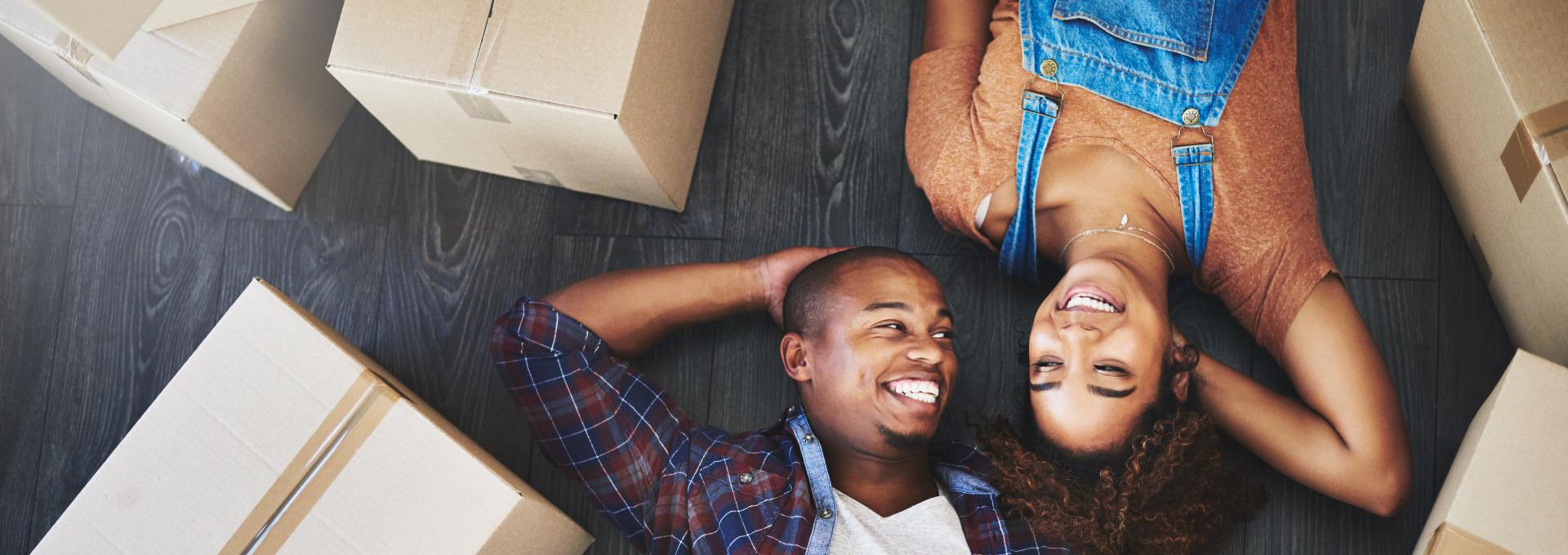 Man and woman laying on floor