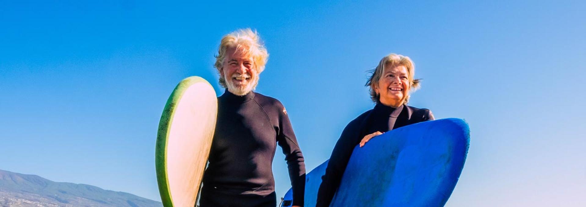 Two surfers at the beach. 