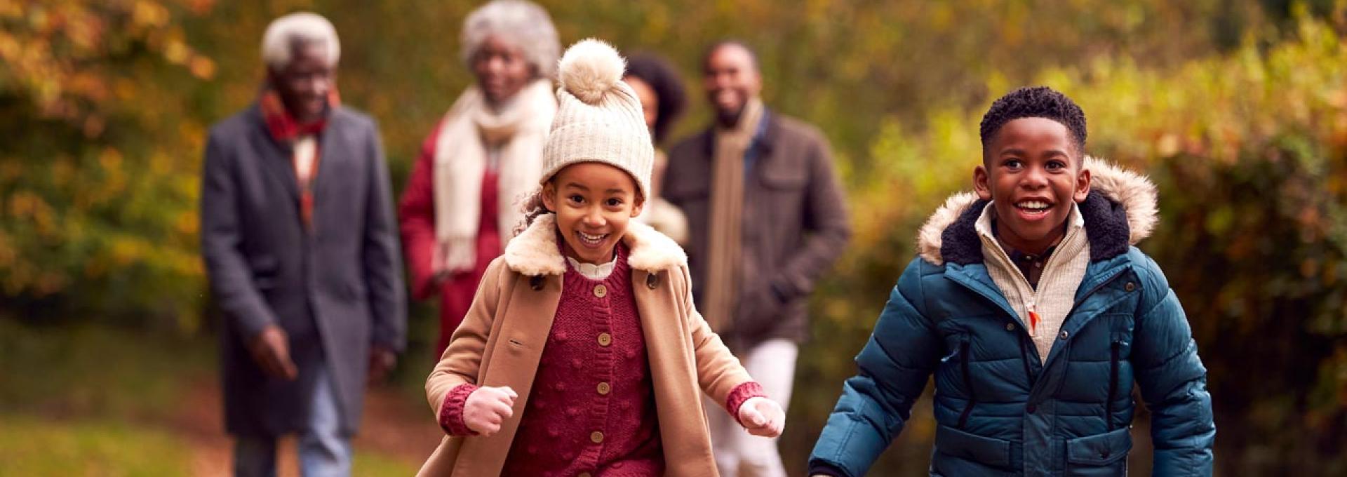 Multi-Generation family walking through countryside