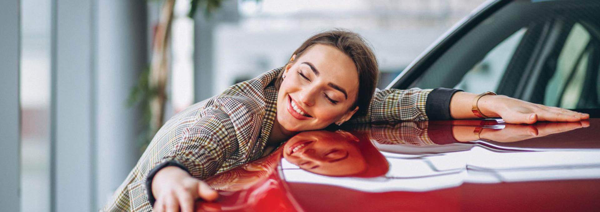 A person and their new car.